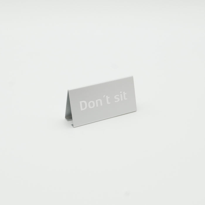 Don't-sit sign